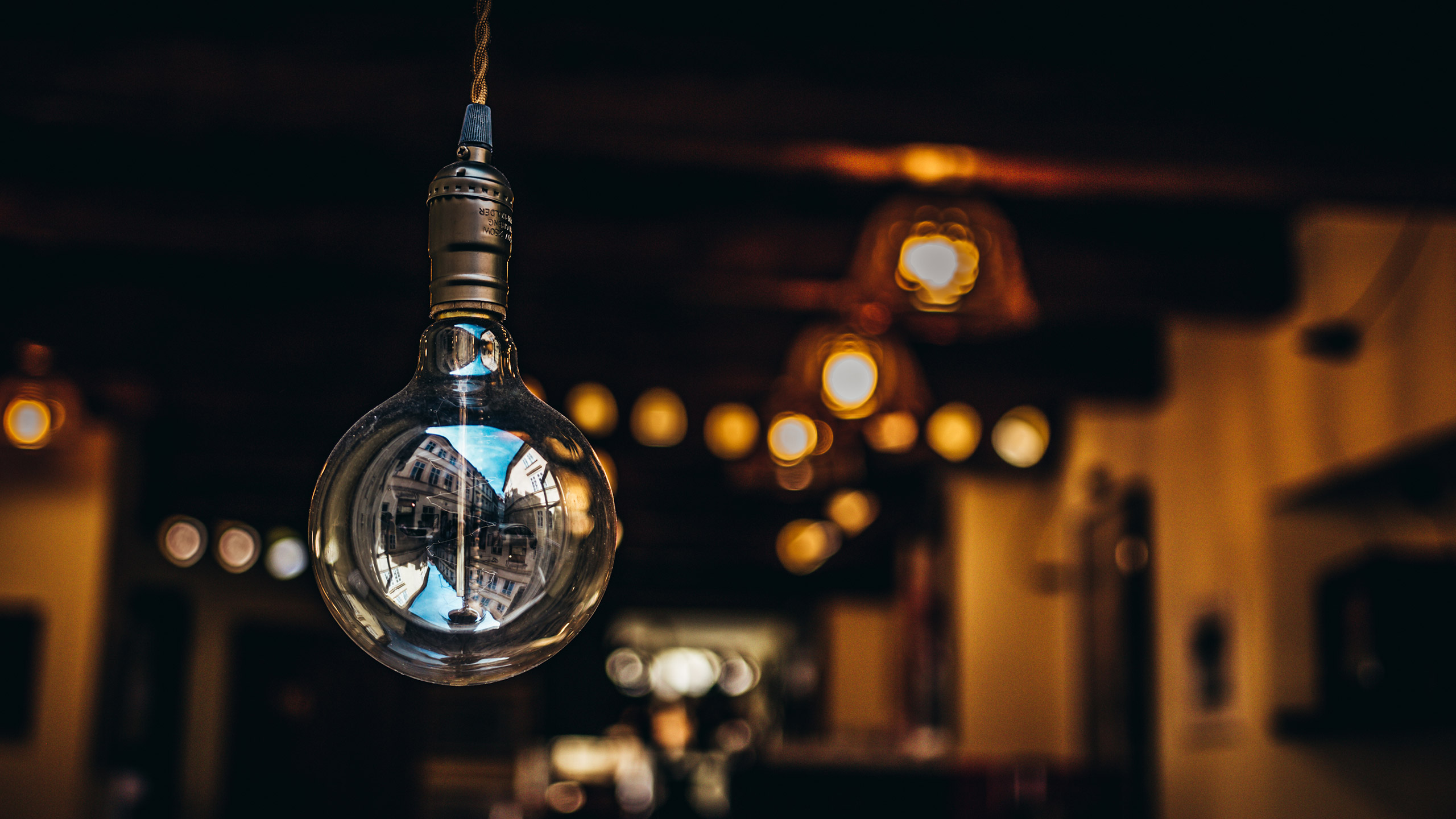 close up of lightbulb outside restaurant