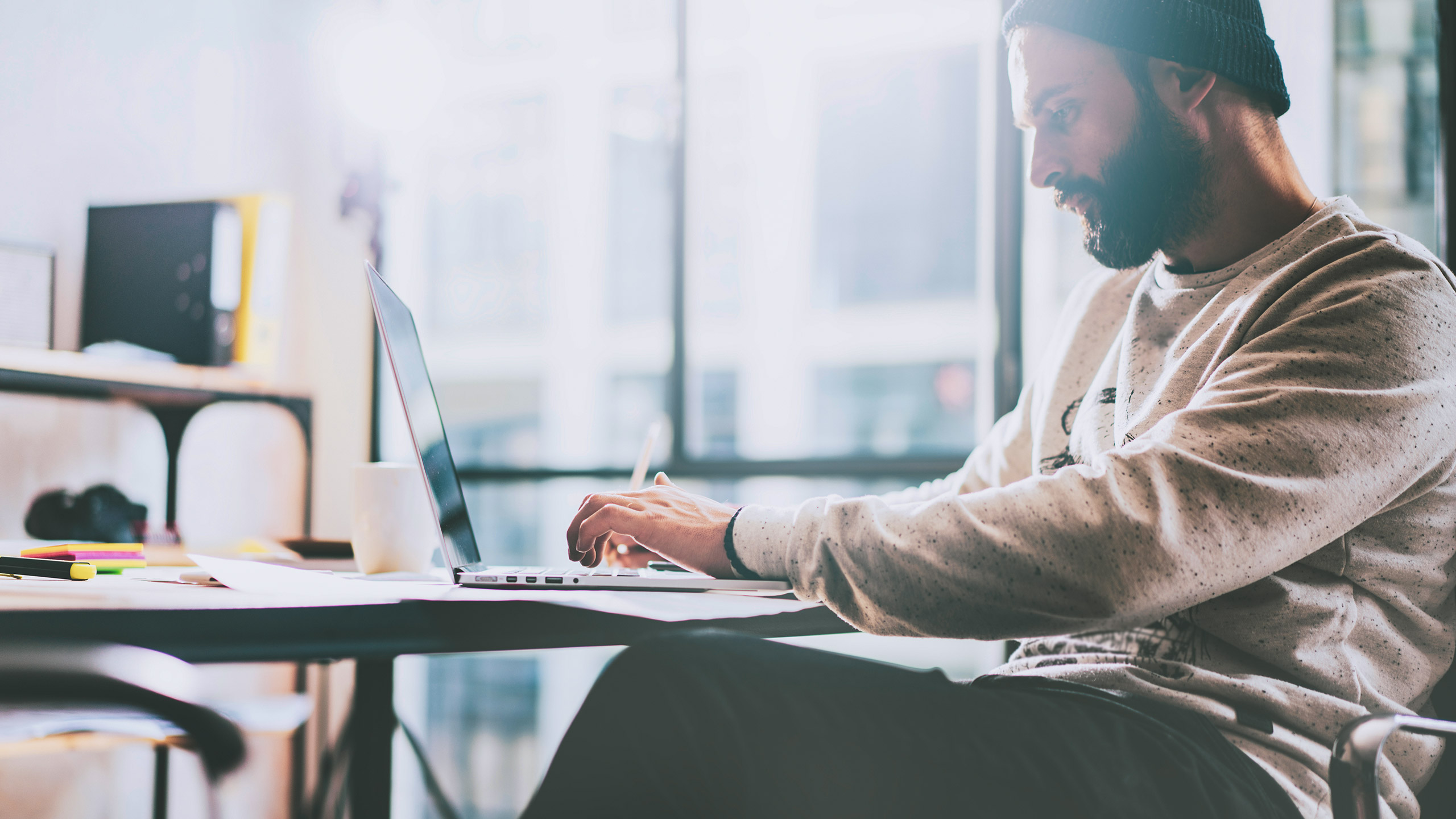 Designer working on the design process at his desk