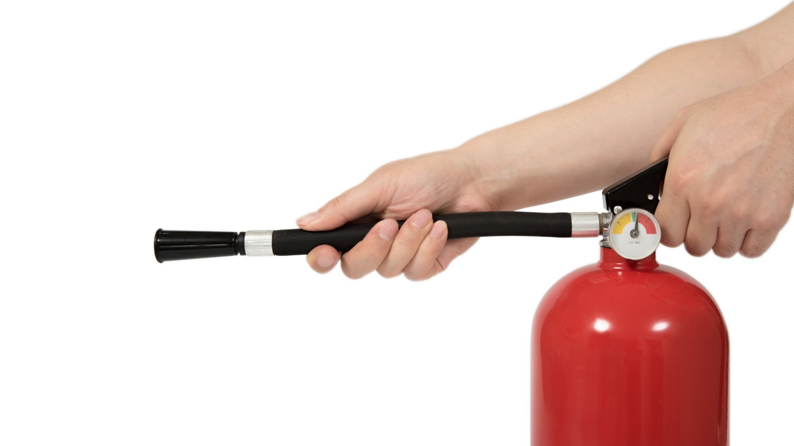 Person operating a fire extinguisher