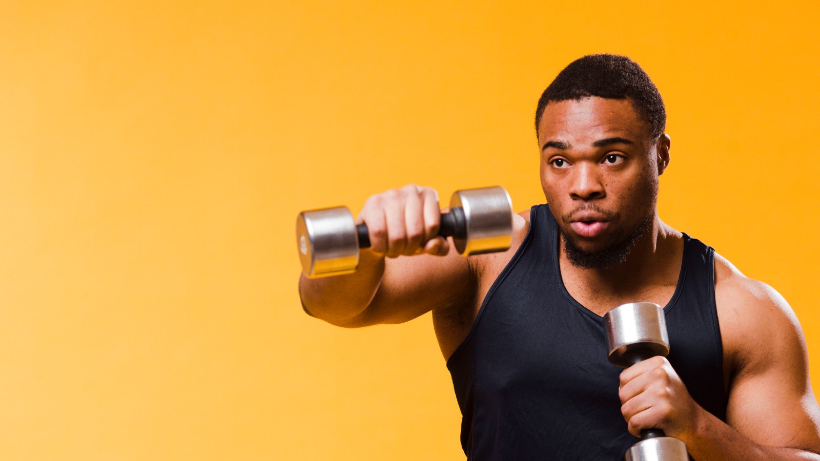 Man exercising with dumbbells