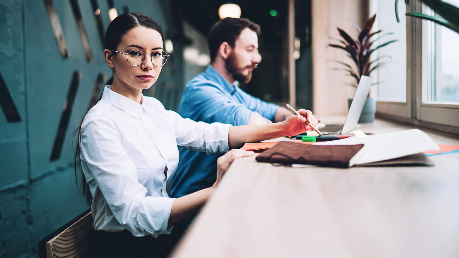 Professionals working at a table