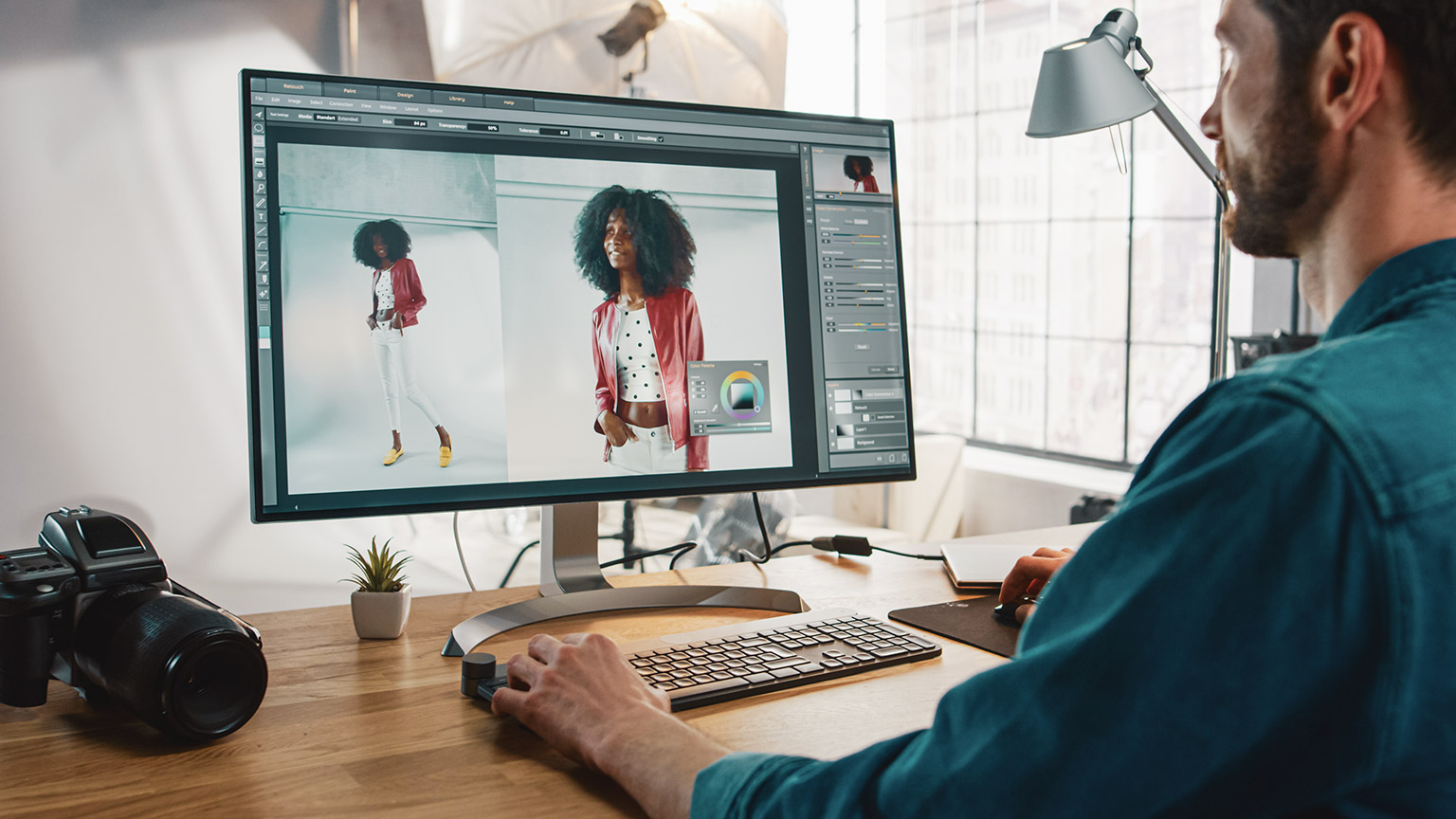 Man at desk photo editing