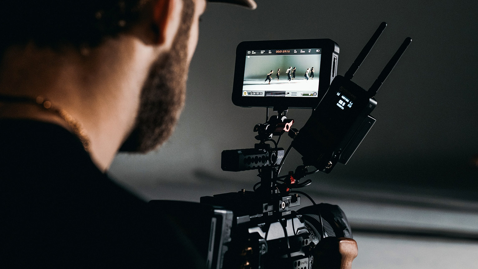 Man using video camera