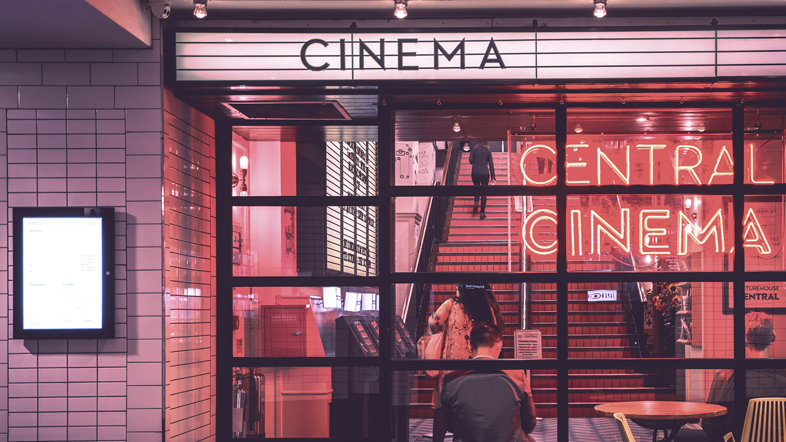 Old style cinema with neon sign