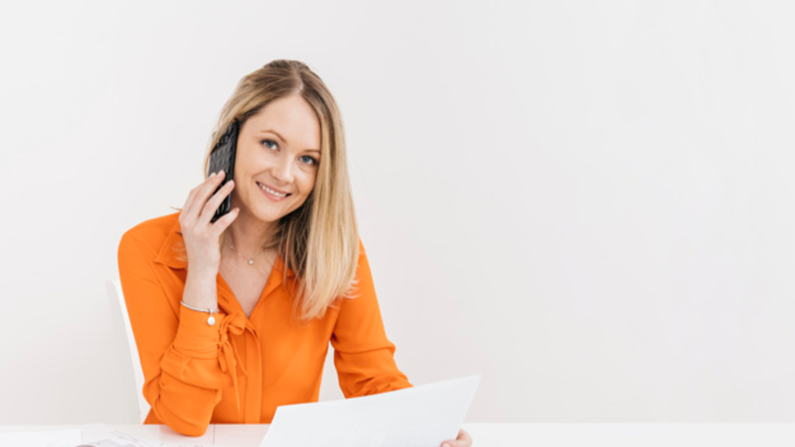 Business woman on smartphone