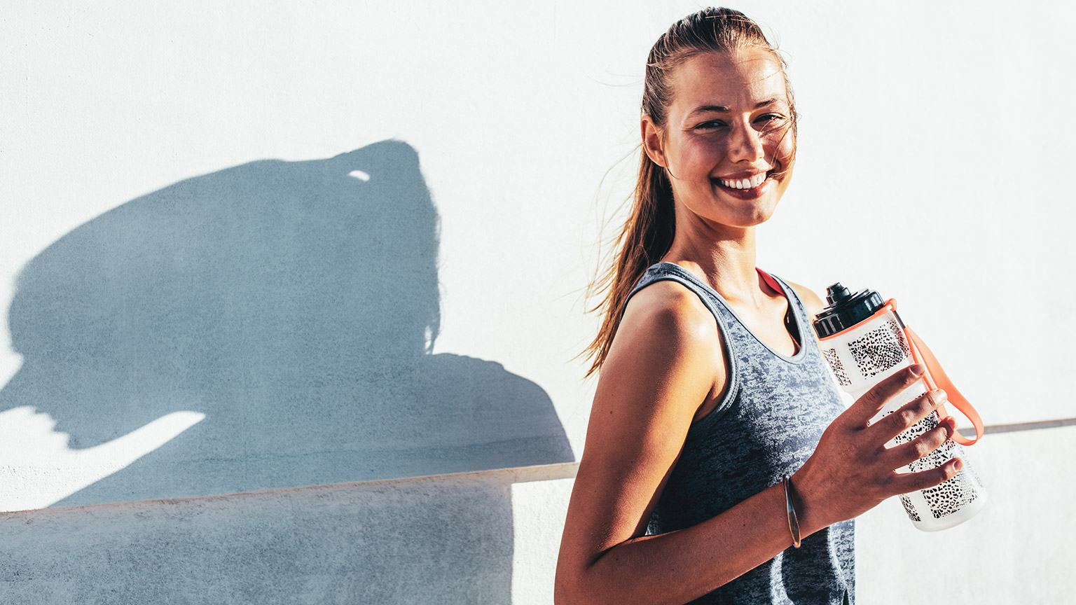 A business employee looking healthy and happy after a workout