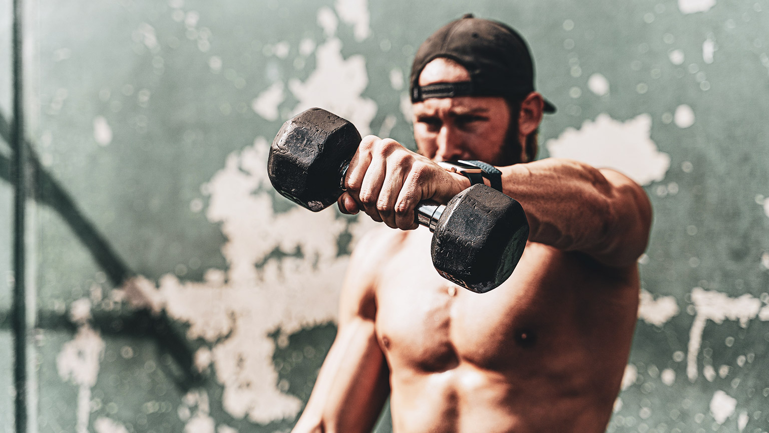 An employee doing a workout at a fitness facility in order to maintain mental wellness