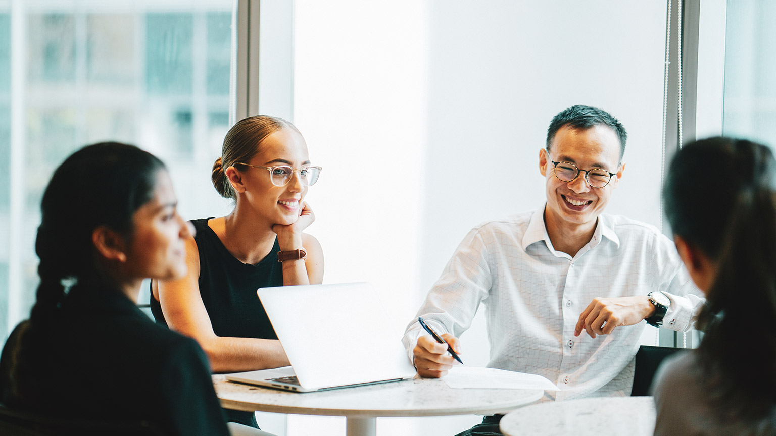 A business executive chatting with international clients