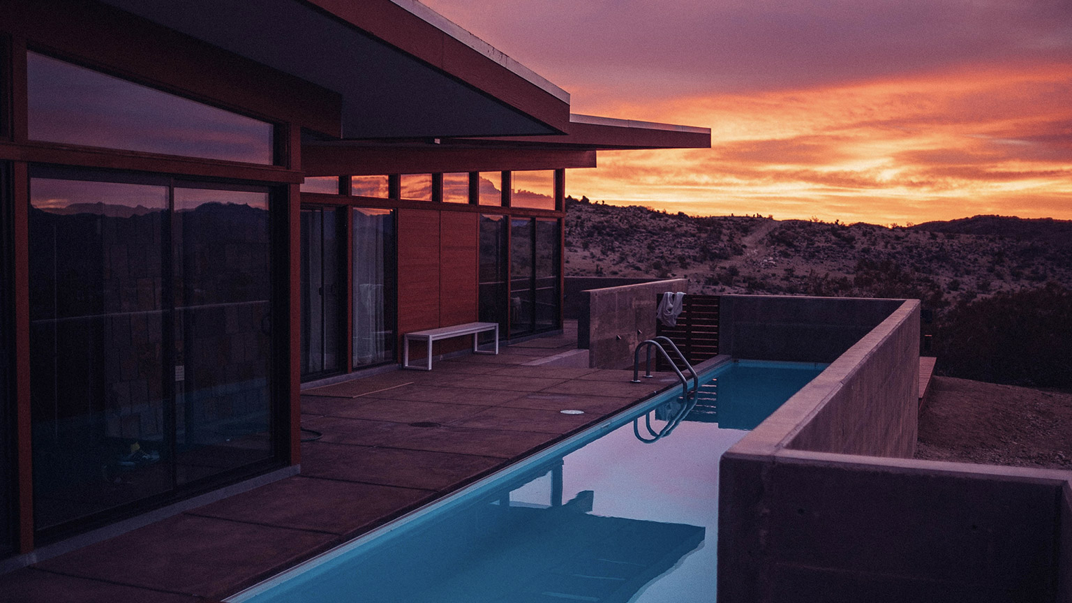 The exterior of a modern house at sunset