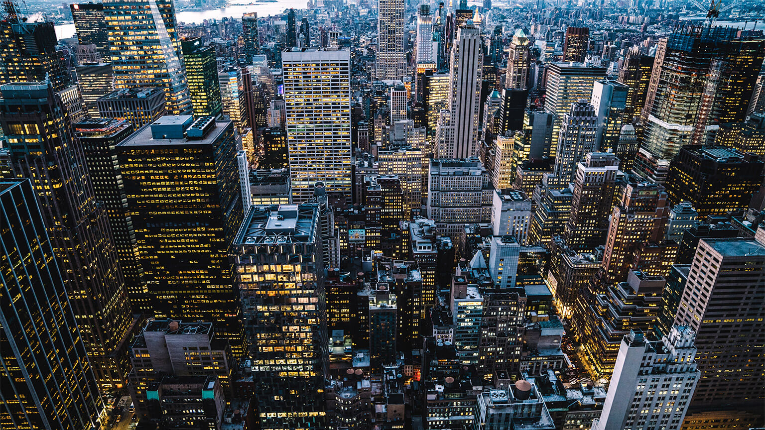 A busy cityscape at dusk