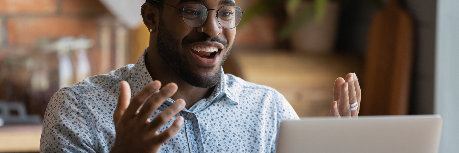 Person on pc enjoy reaching successful result