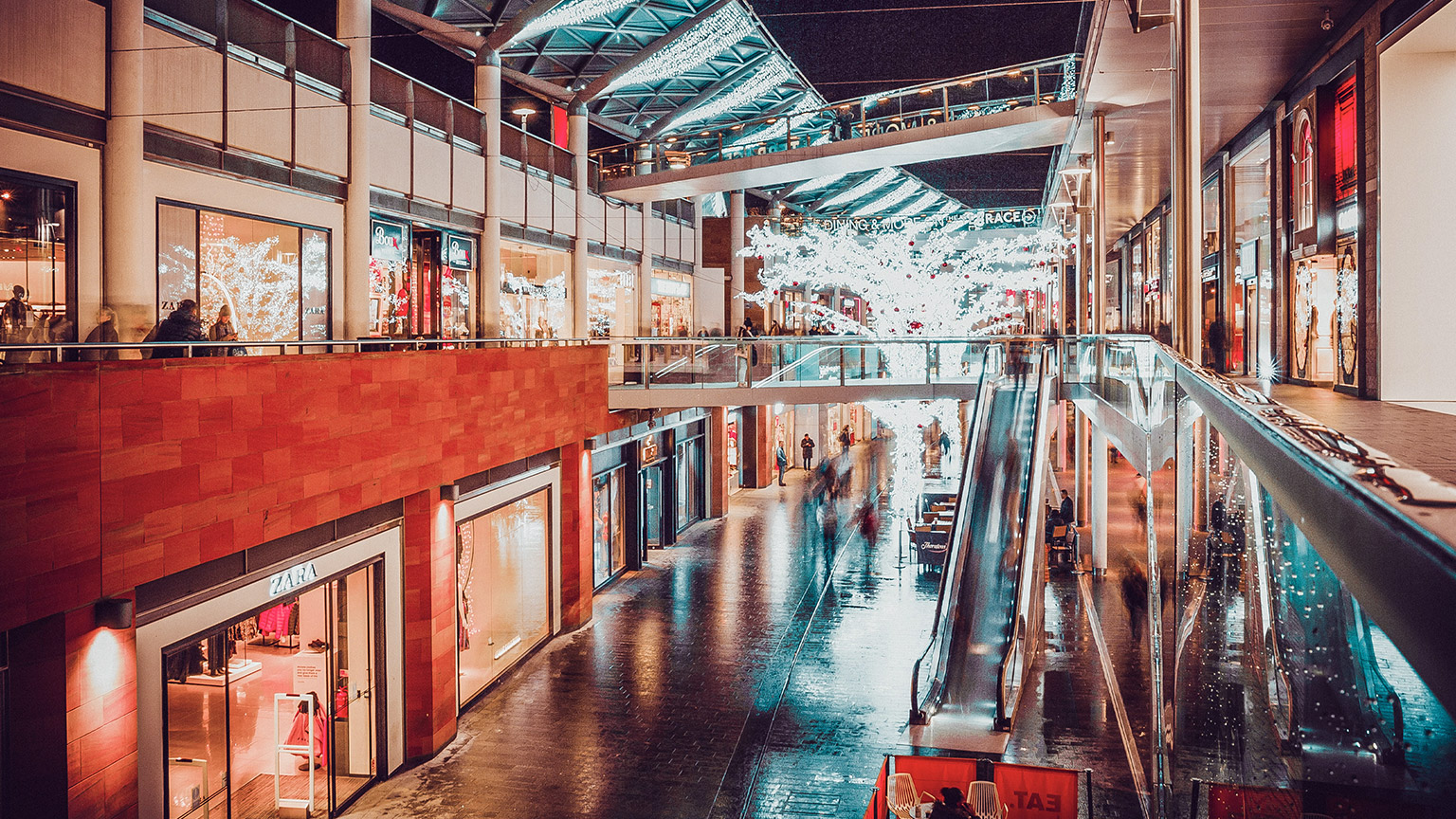 A wide angle image of a modern shopping precinct