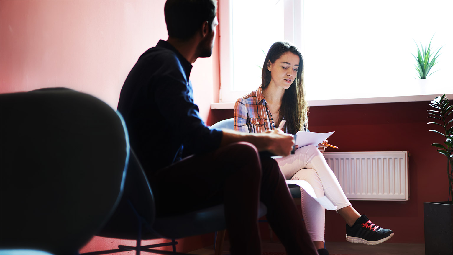 A professional interviewing a candidate for an open position in their team