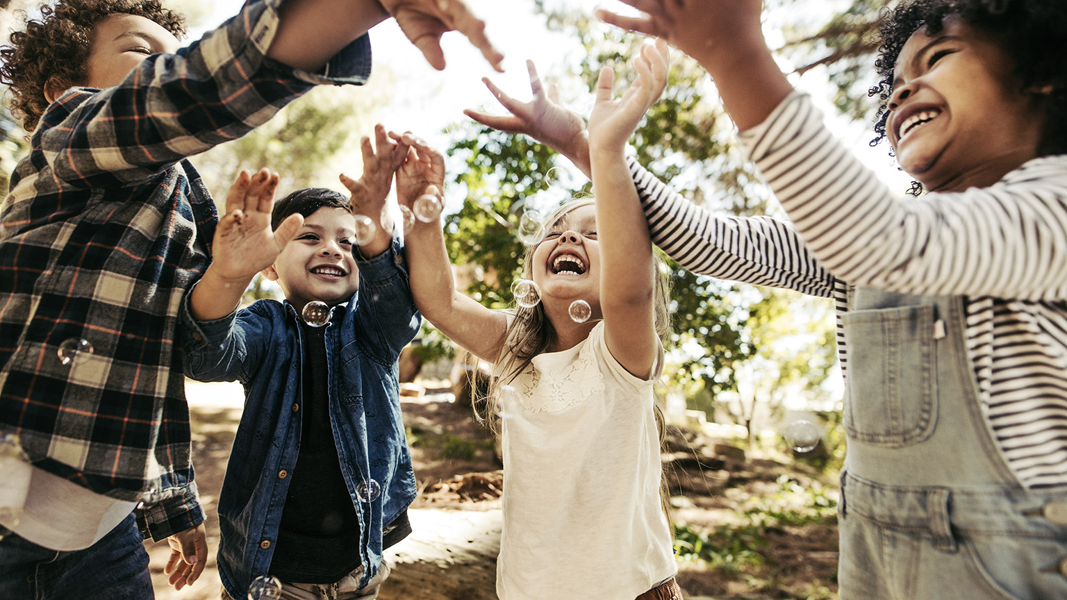 a group of children happily playing