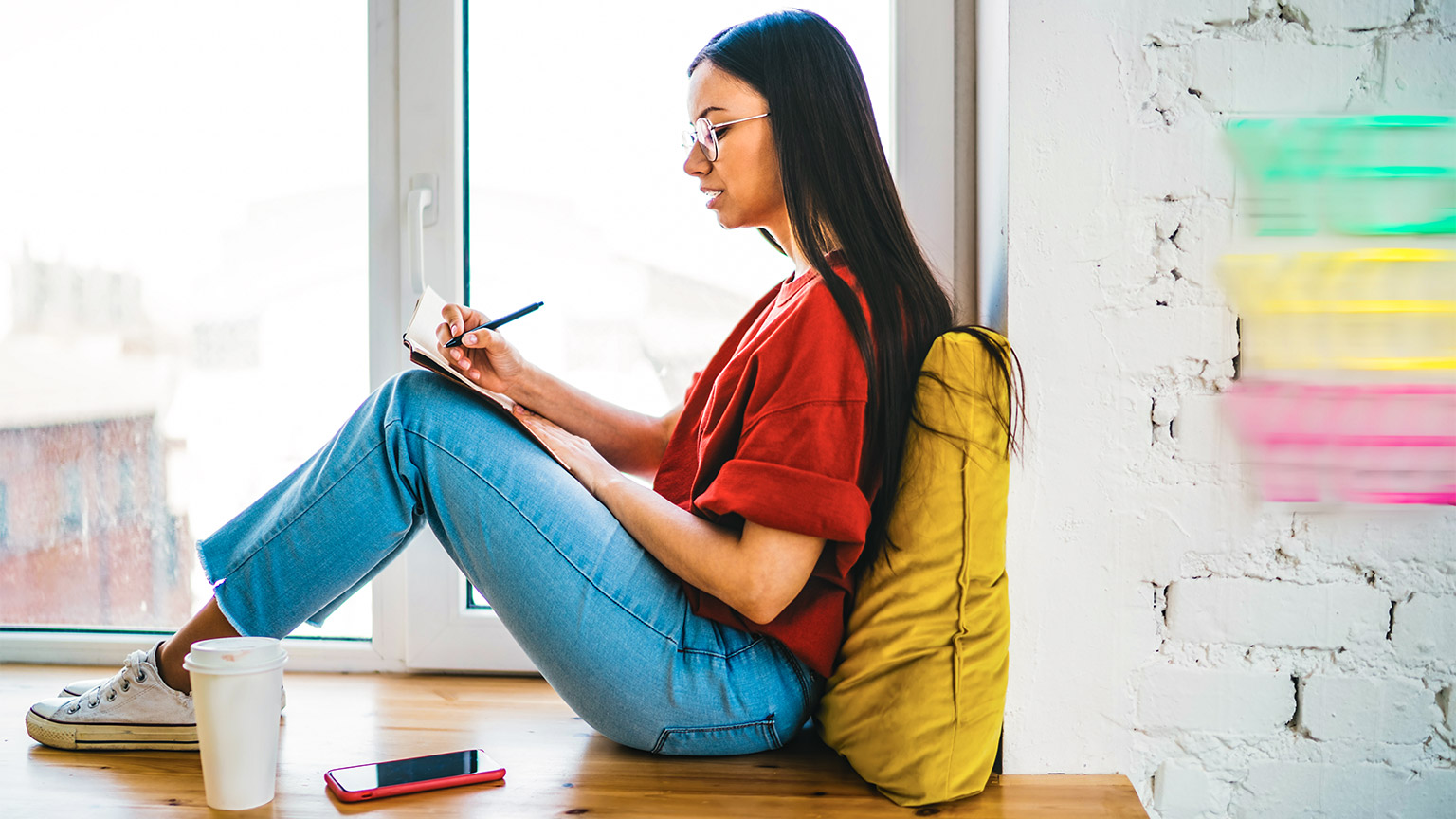 A healthcare worker reading a text book on their day off