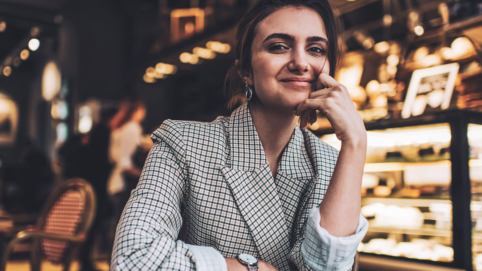 A confident young entrepreneur smiling at the camera