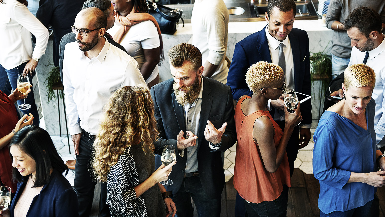 A top shot of a business and industry social gathering