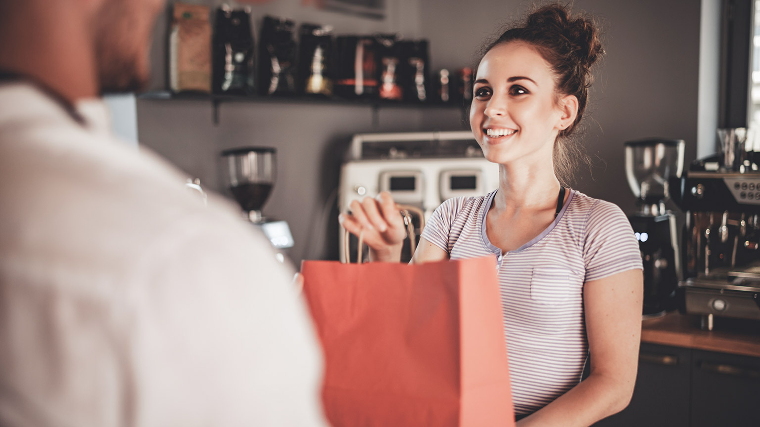 A business owner finalising a sale with a customer