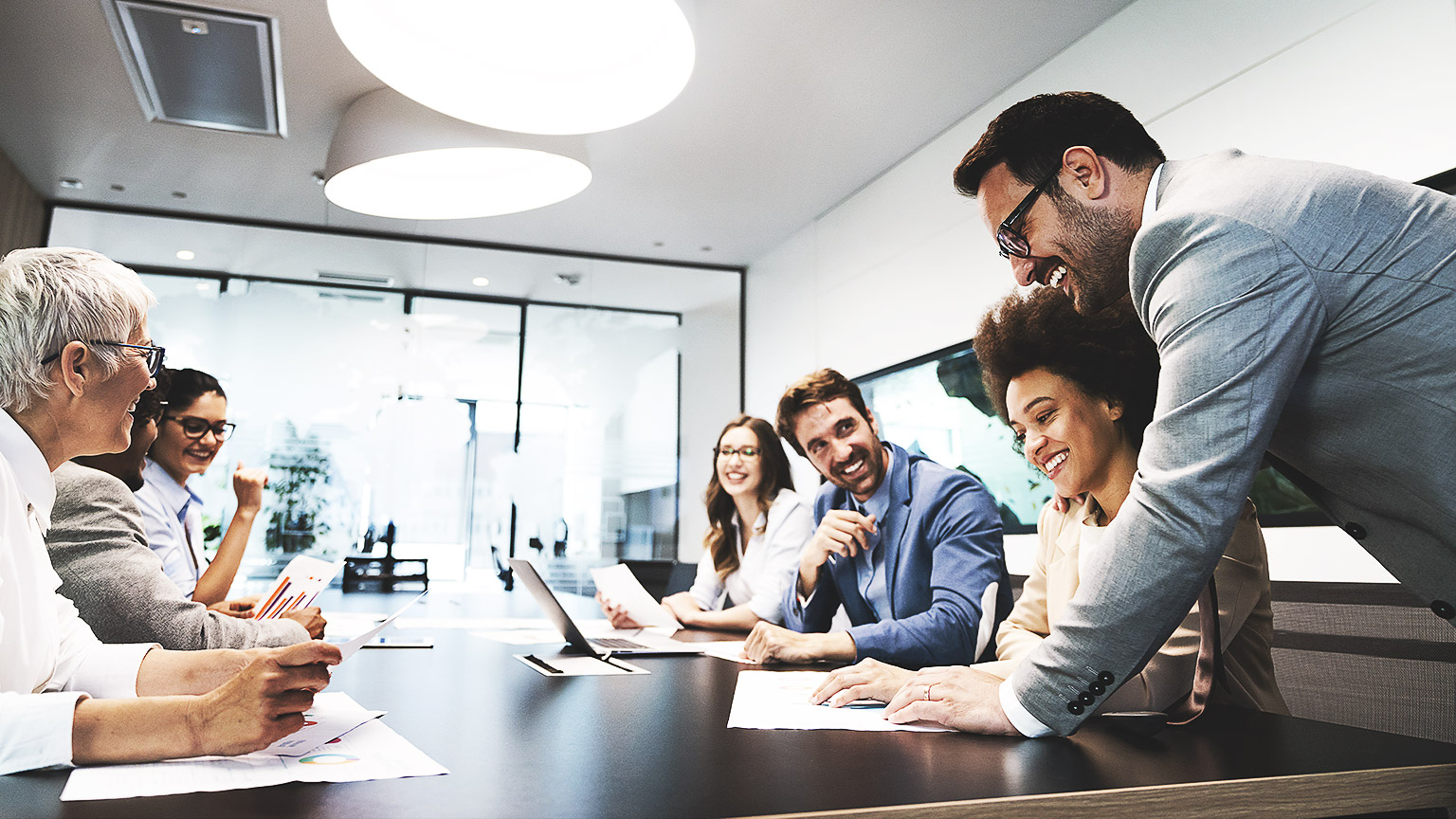 People having a meeting at a nice board room