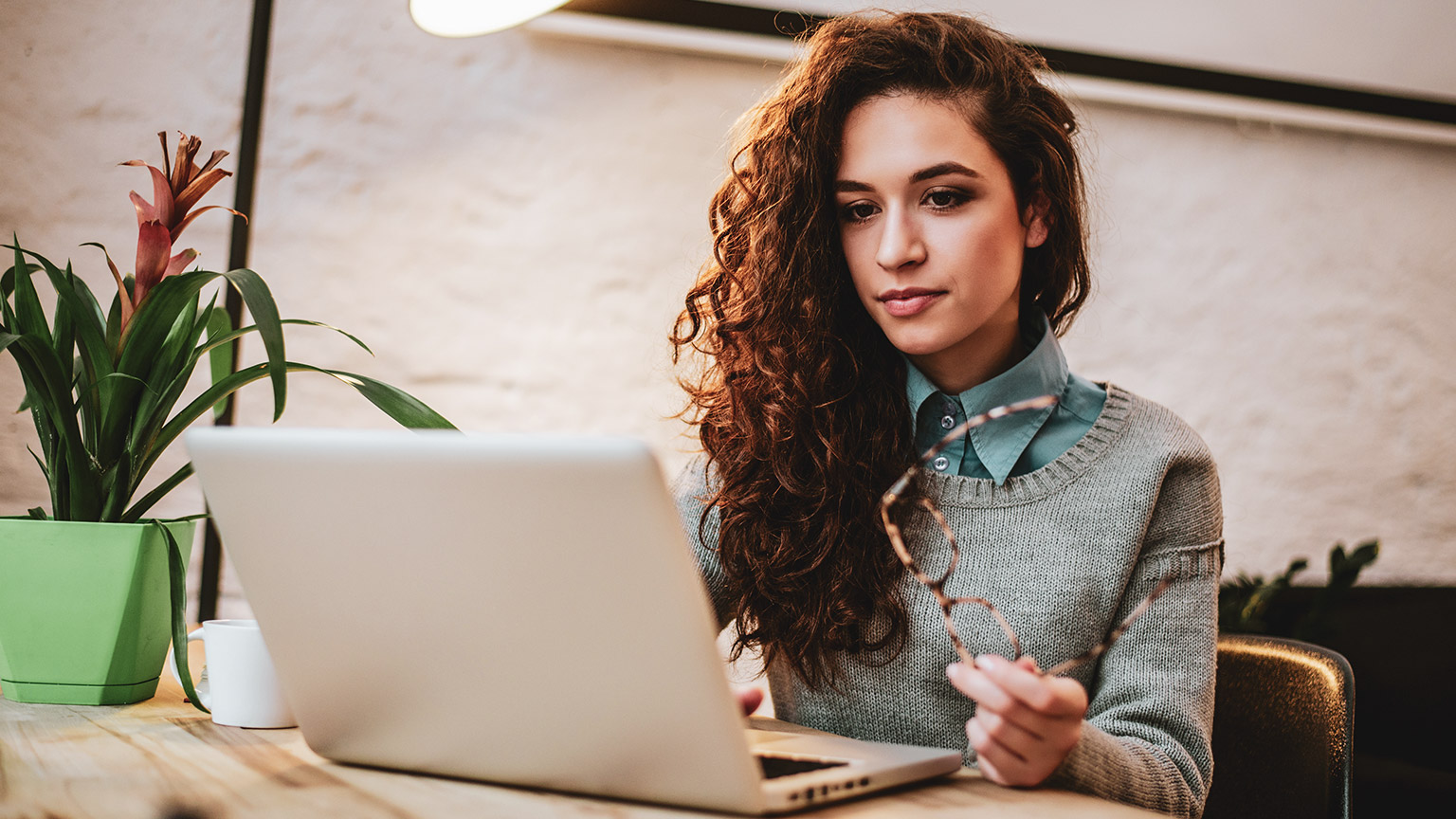 A bookkkeeper working in a relaxed office environment