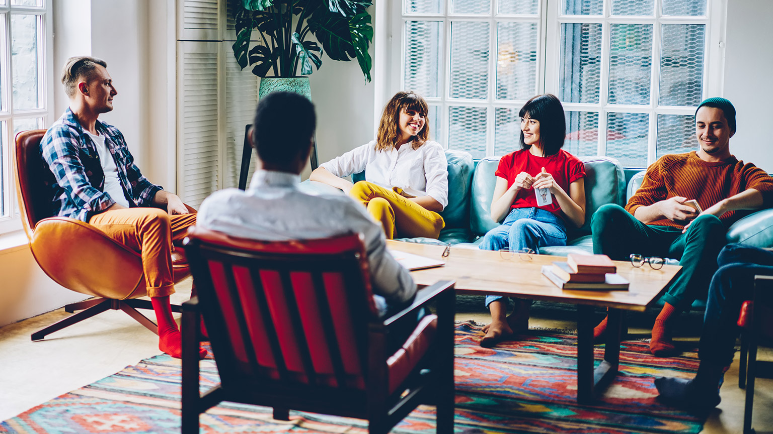 A group of colleagues in a casual meeting