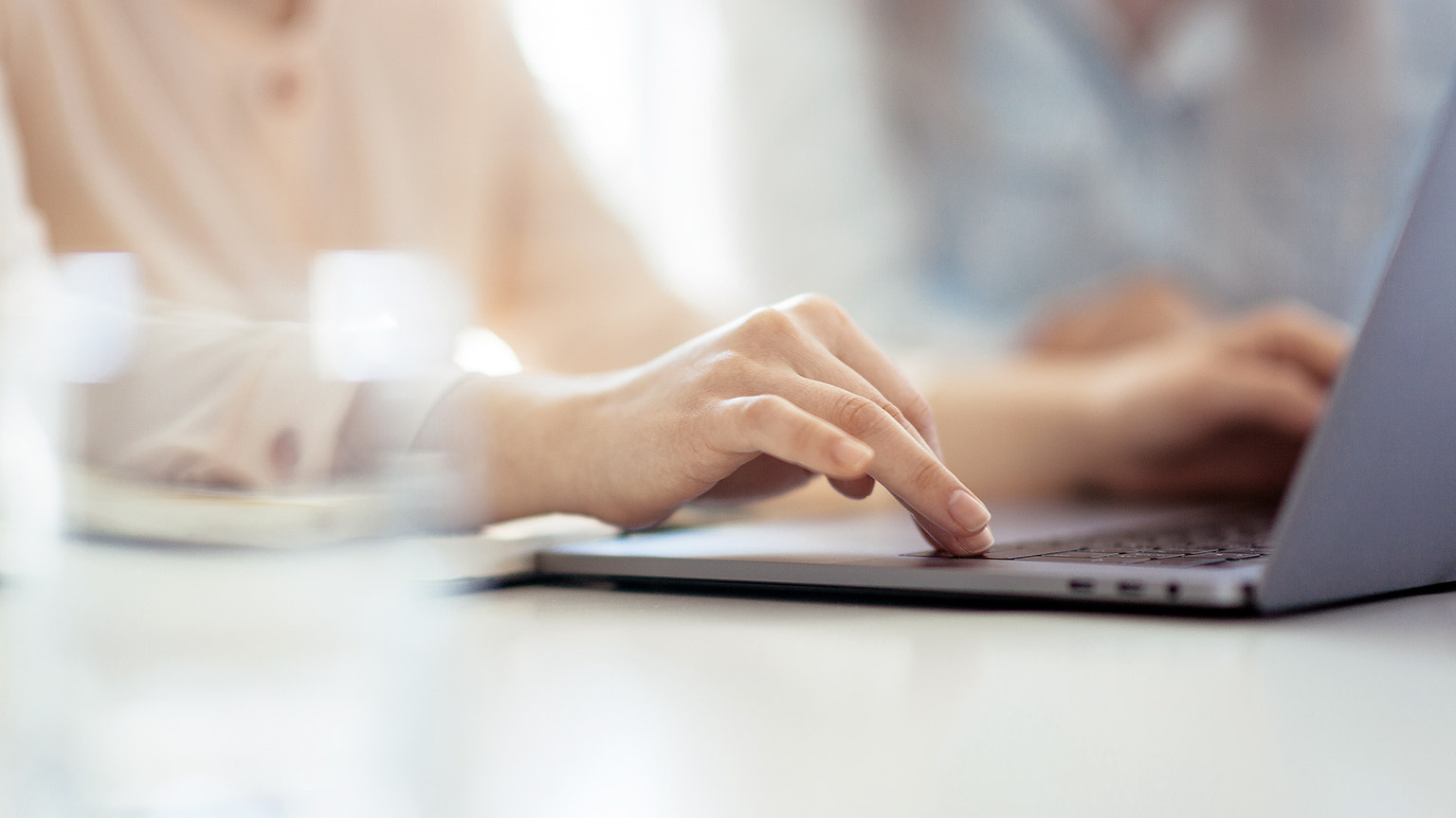 woman hand typing on computer