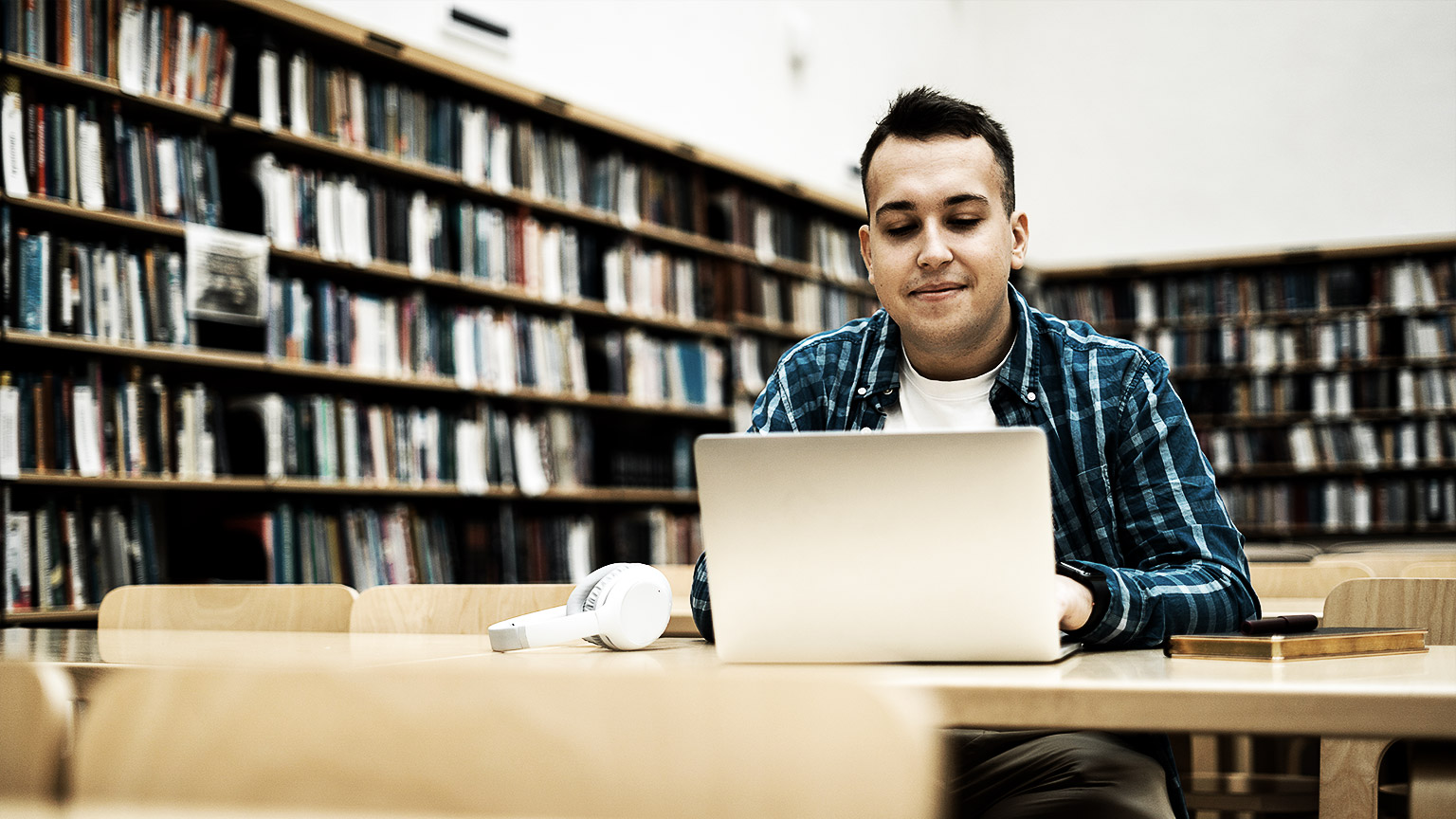 A person researching in a library 