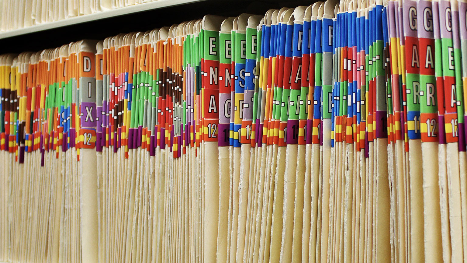 Folders organized in a rack