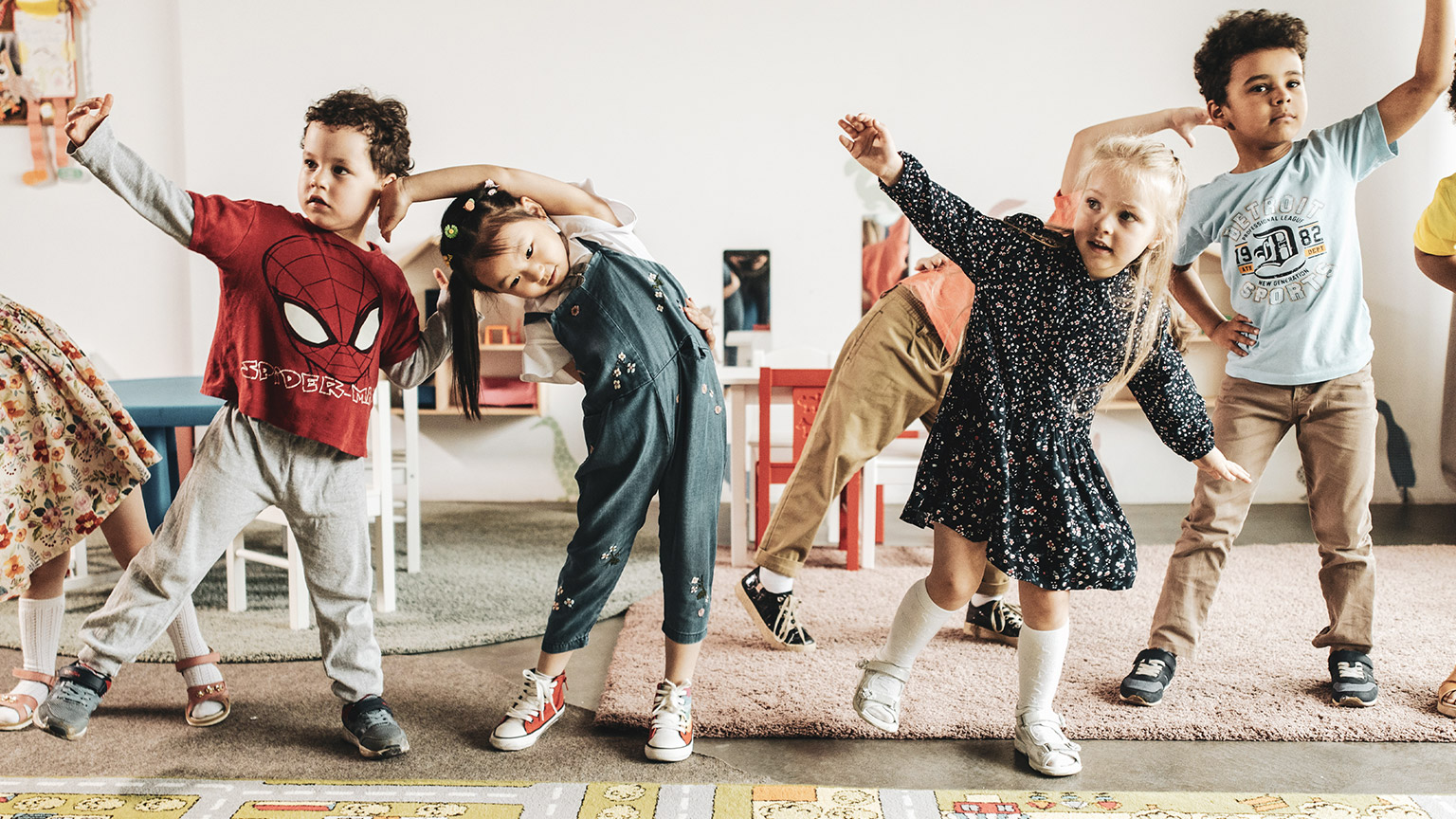 A group of kids playing in a childcare centre