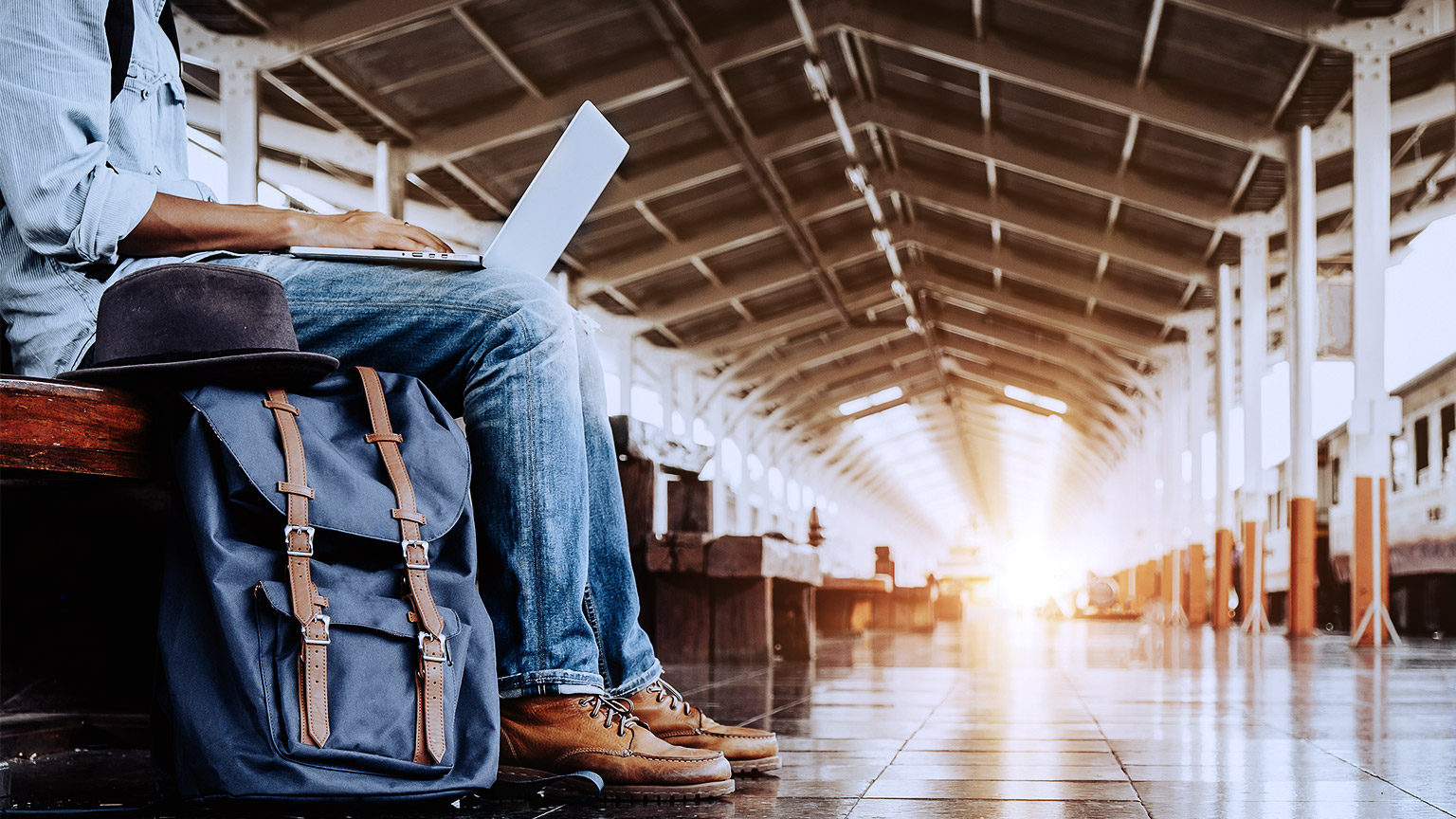 Man working with computer on travel