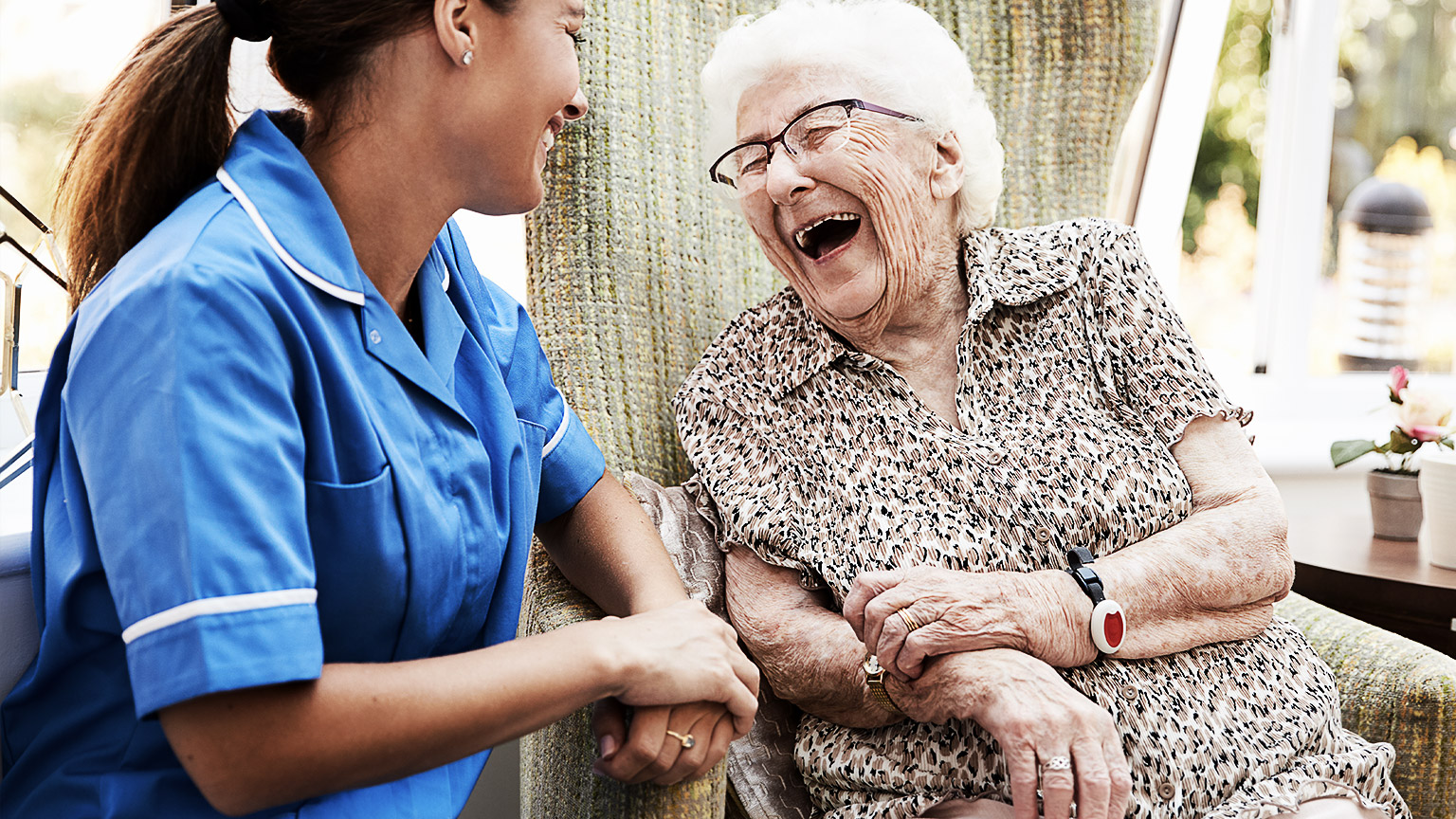 Carer speaking with elderly person