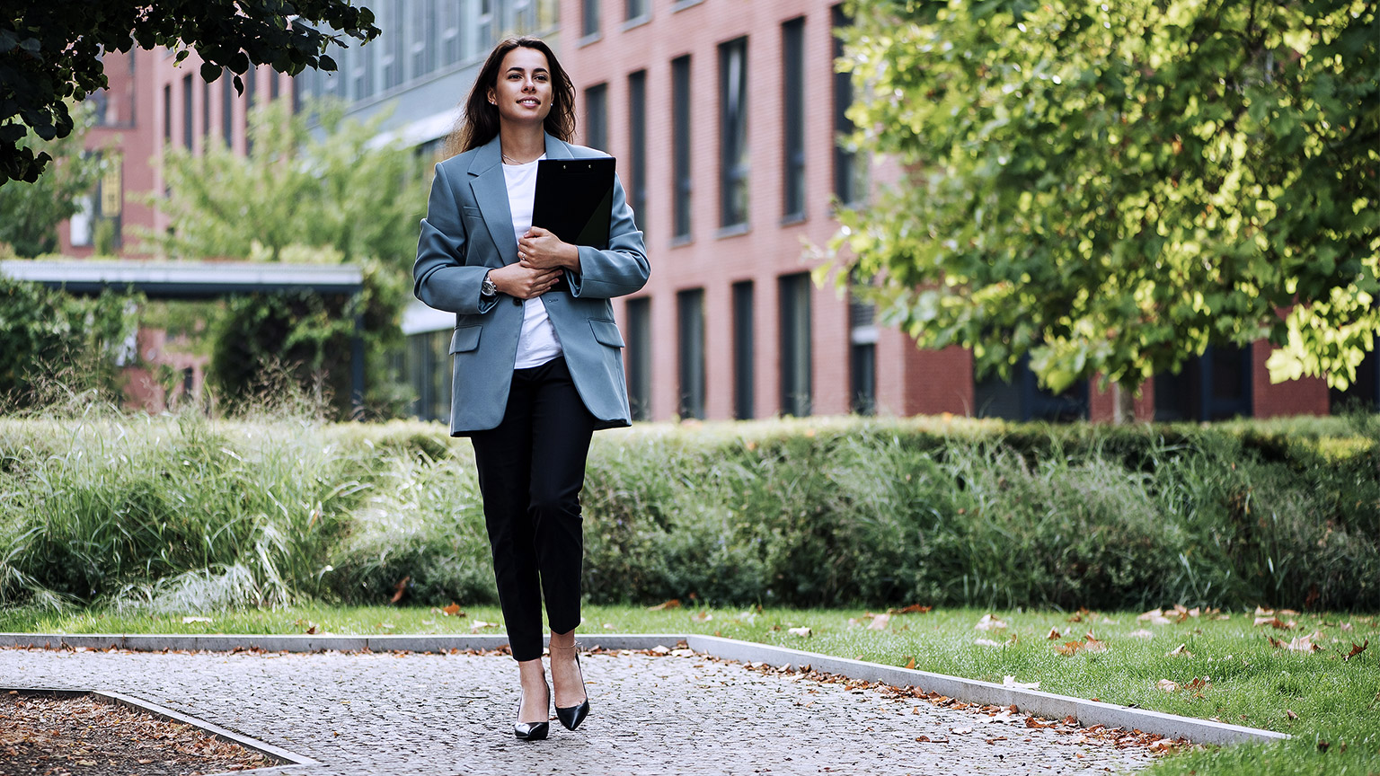 Business woman walking outdoor