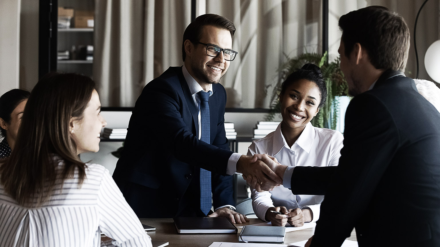 A group of people having a meeting