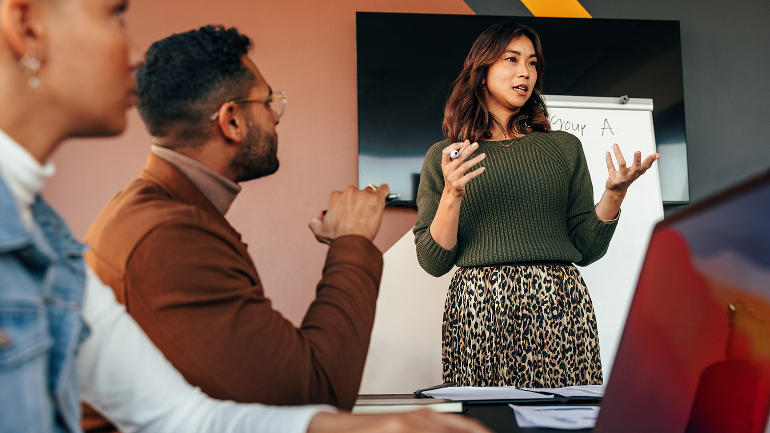 A manager making a presentation to colleagues