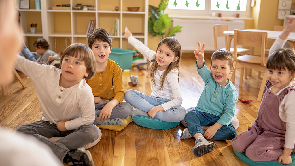 Active preschool Children Interacting with their Teacher