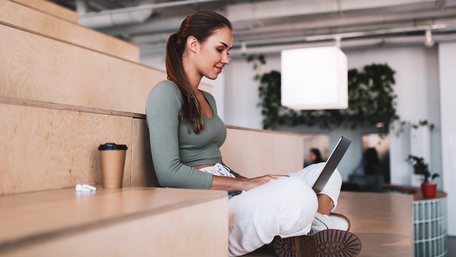 A person planning work on a laptop