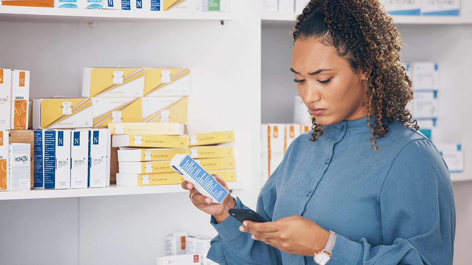 A person reading medication label