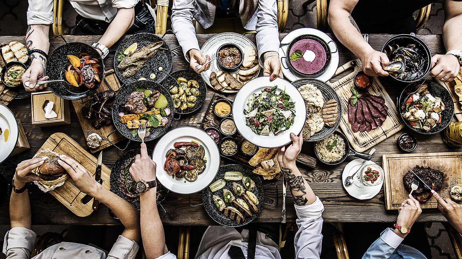 A top shot of a group of people eating healthy