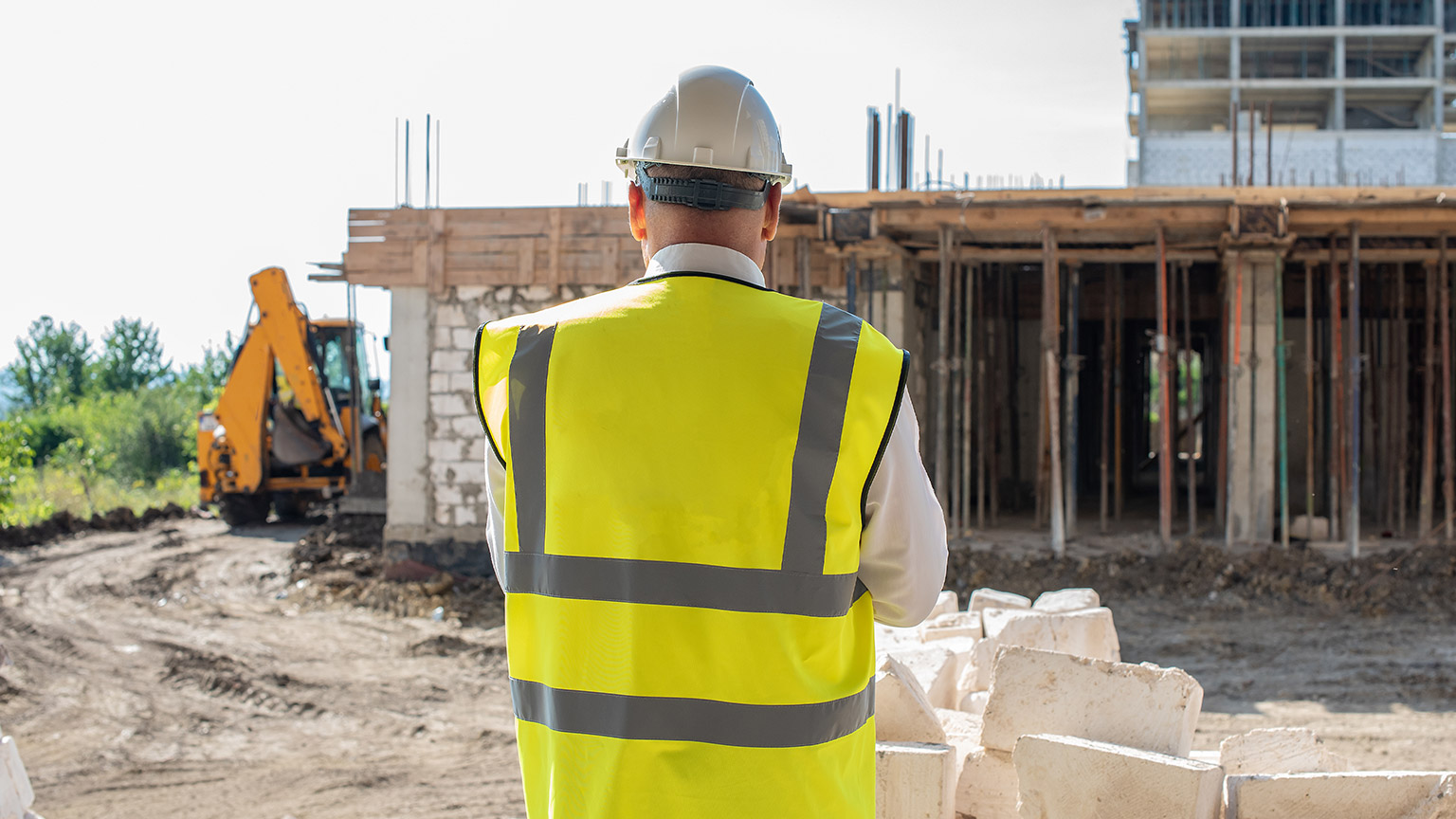 An inspector on a building site