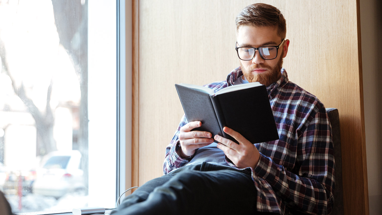 A person sitting and reading