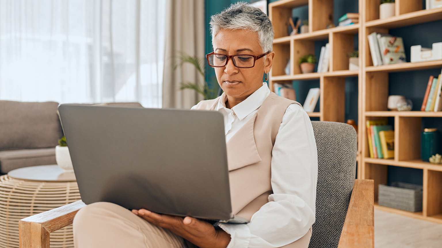 A therapist reading information on a computer