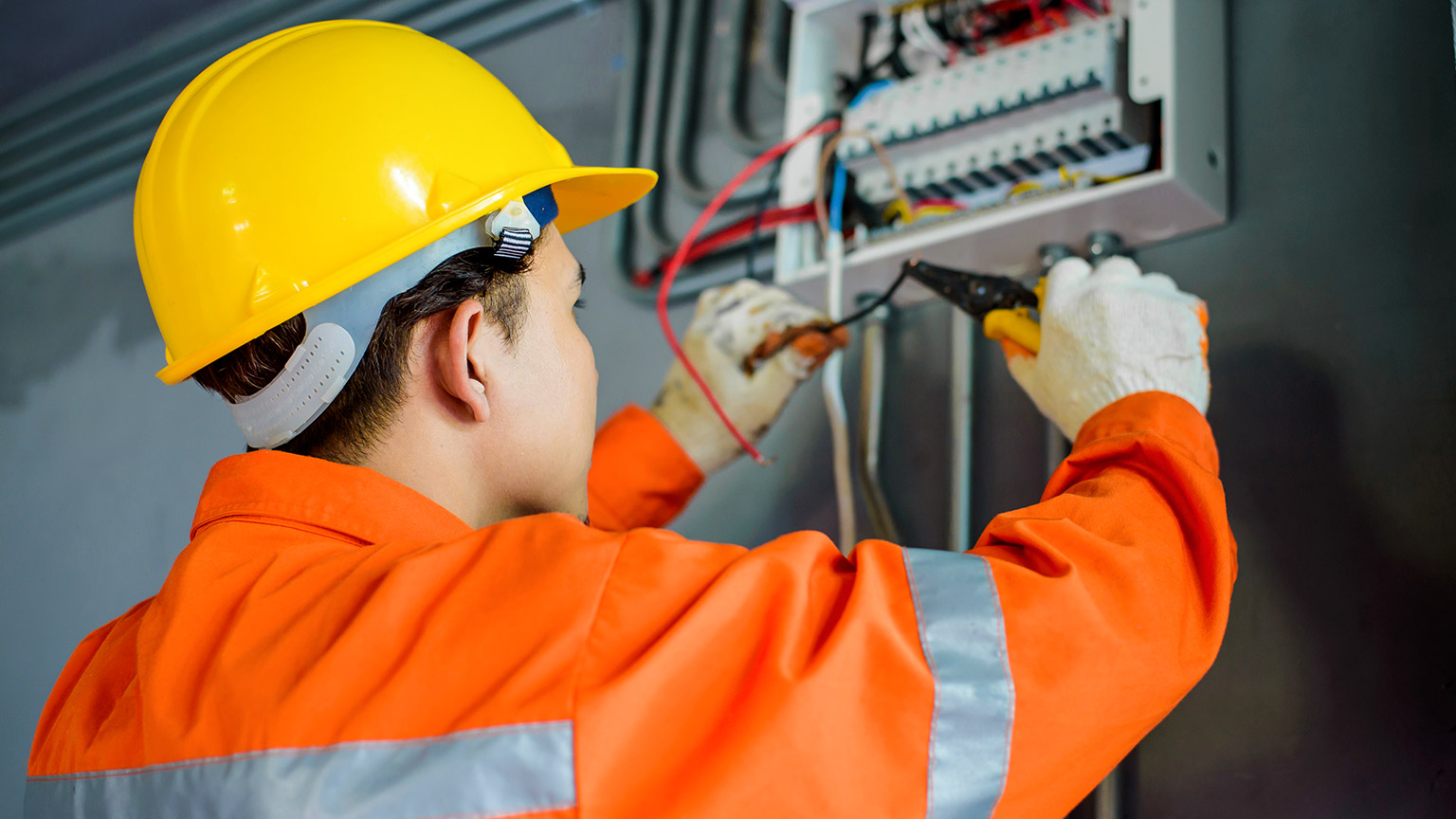 An electrician working on a job onsite