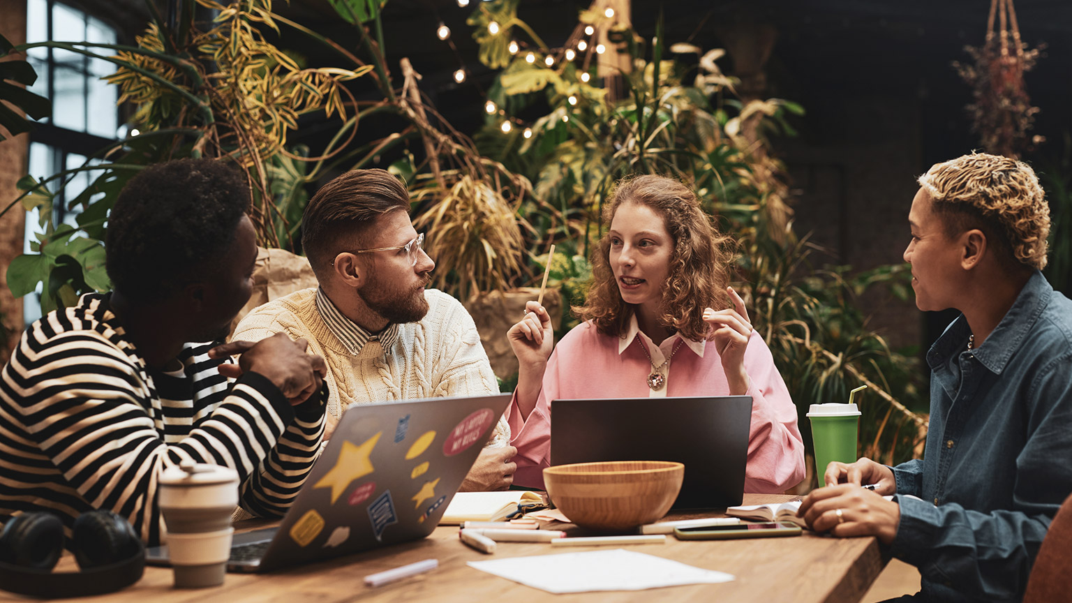 A team of coworkers talking about a project