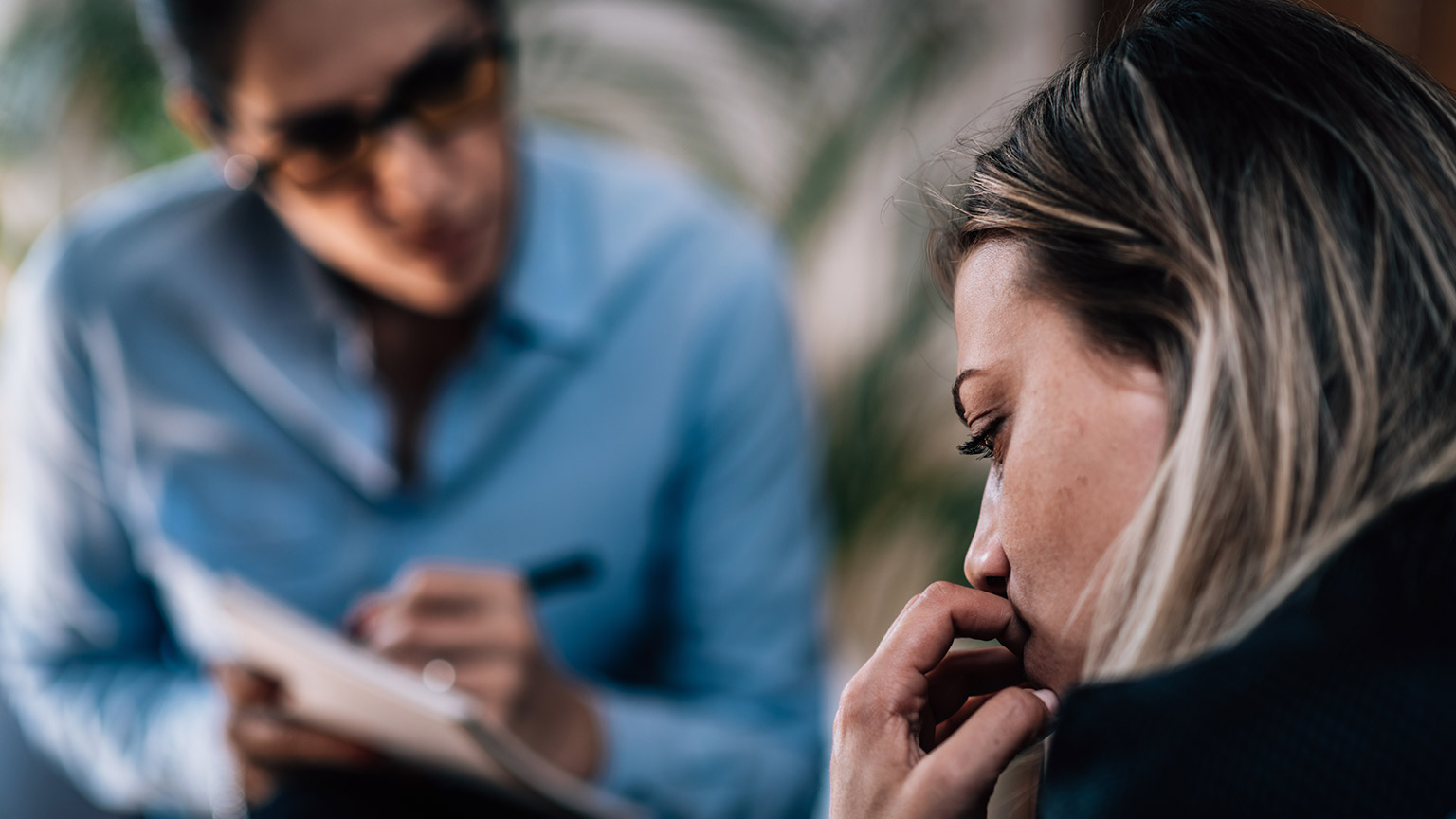 A counsellor talking to a client