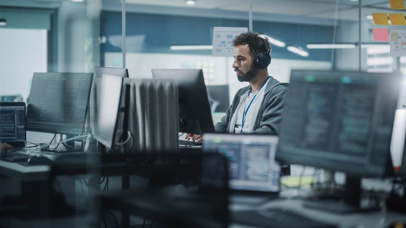 A programmer at work in an office