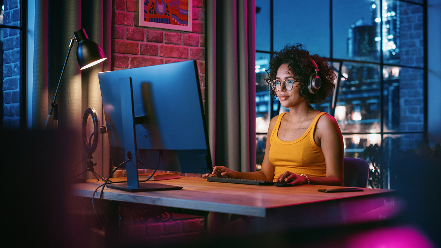 A person working on a desktop computer