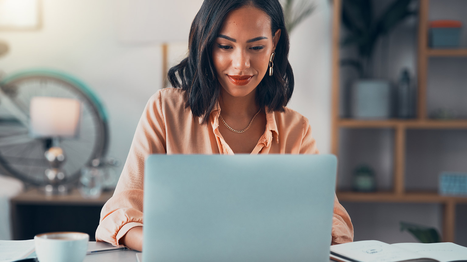 A person reading information on a laptop