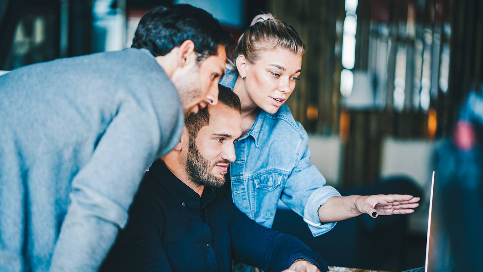 A group of designers discussing a project