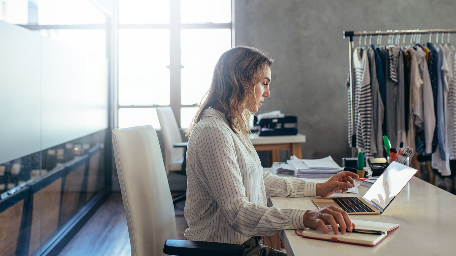 A small business owner at work in an office