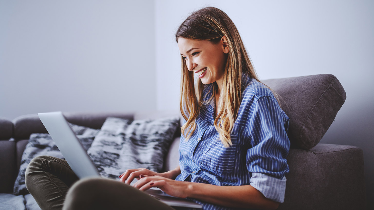 A person reading info from a laptop